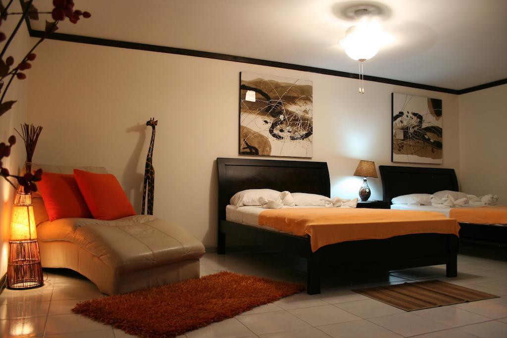 Tuanis Aparthotel Jacó Zimmer foto